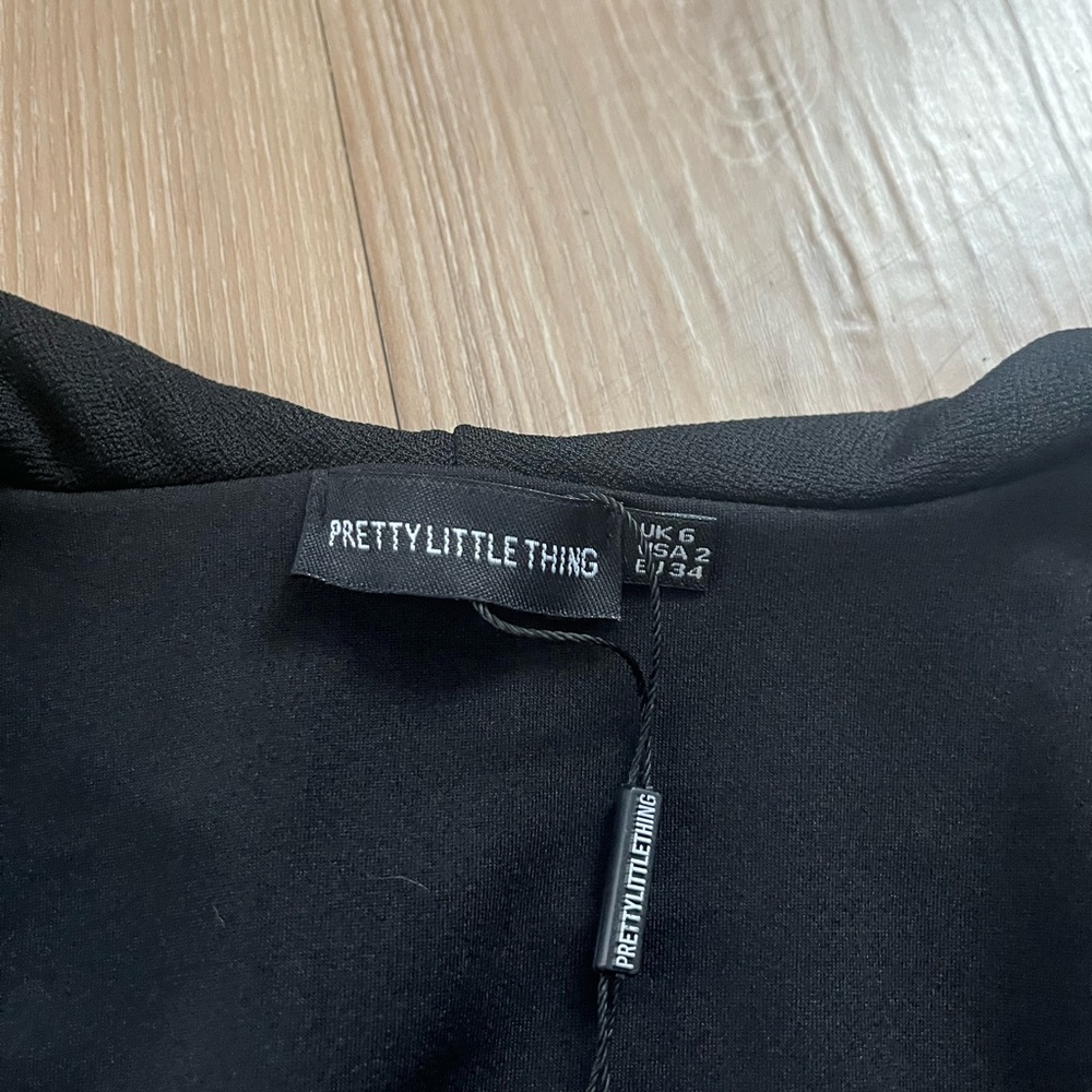 PrettyLittleThing Black Ruffle Mini Dress - Picture 2 of 6
